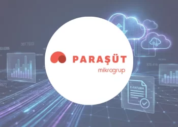Paraşüt logosu ve arka planda dijital muhasebe, e-dönüşüm teknolojilerini yansıtan Kobi Rehberi kapak görseli.