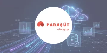 Paraşüt logosu ve arka planda dijital muhasebe, e-dönüşüm teknolojilerini yansıtan Kobi Rehberi kapak görseli.